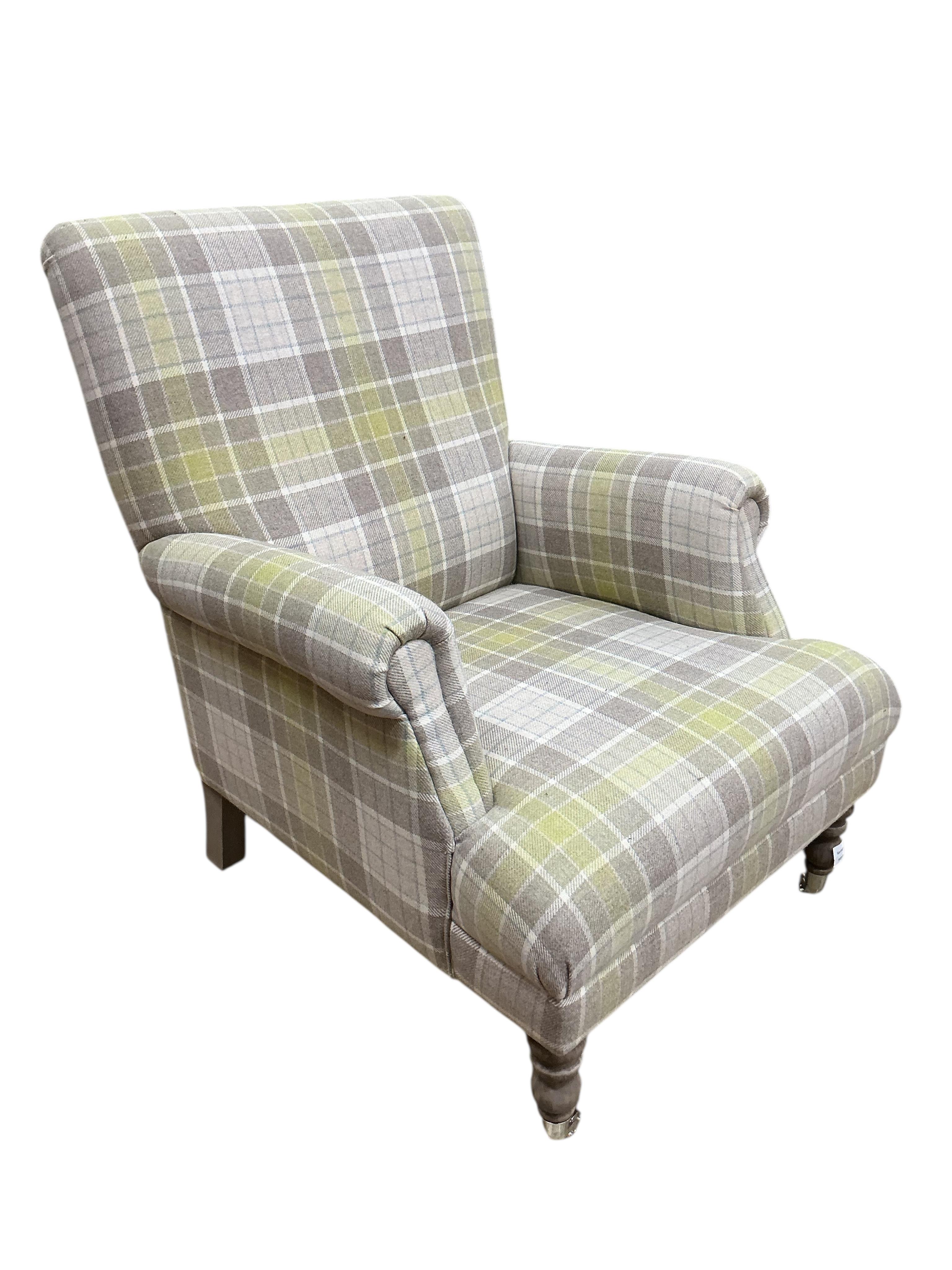 A modern Victorian style wing armchair upholstered in tartan type fabric, width 76cm, depth 76cm, height 90cm